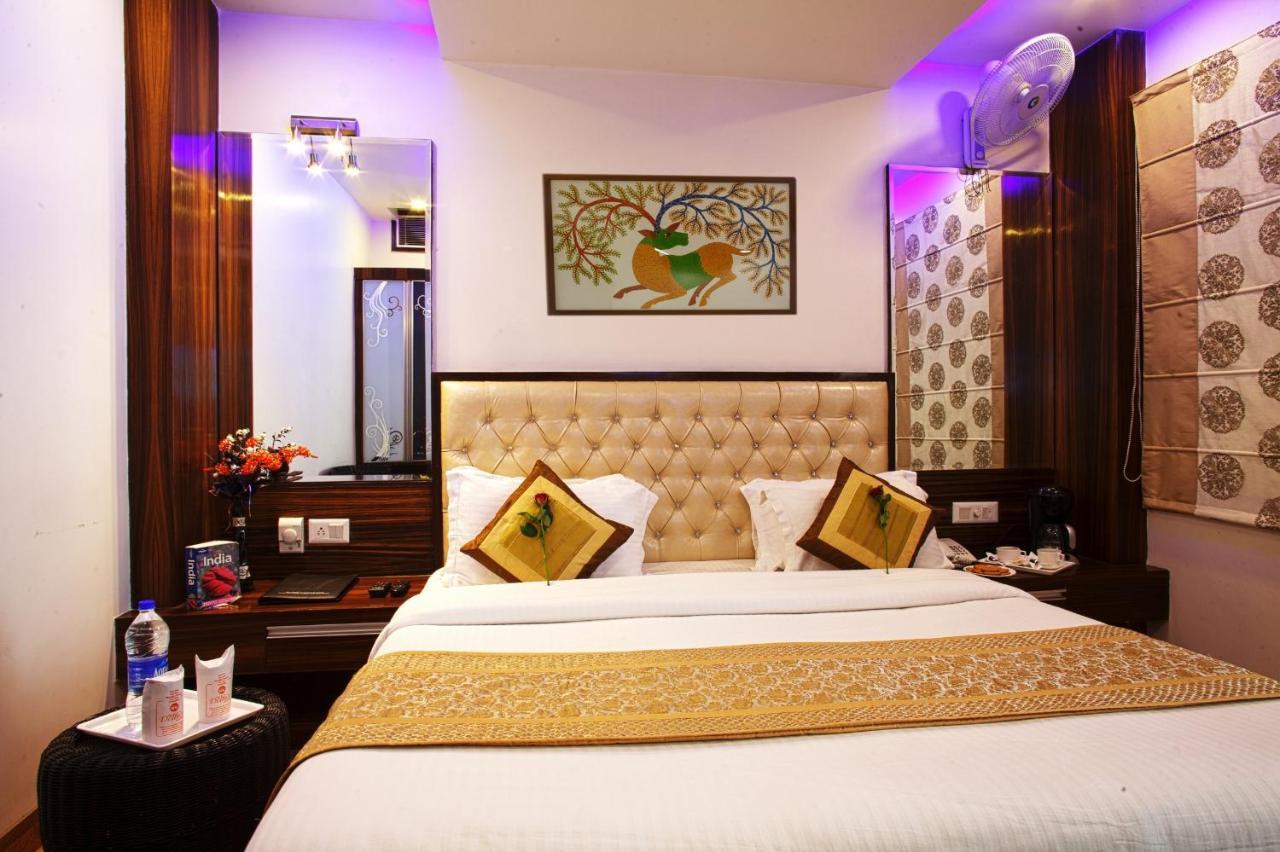Hotel Delhi 55 -City Center Нью-Дели Номер фото