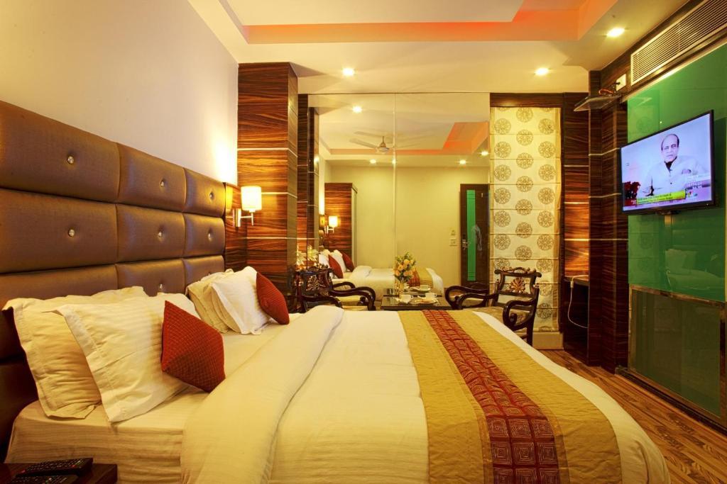 Hotel Delhi 55 -City Center Нью-Дели Номер фото