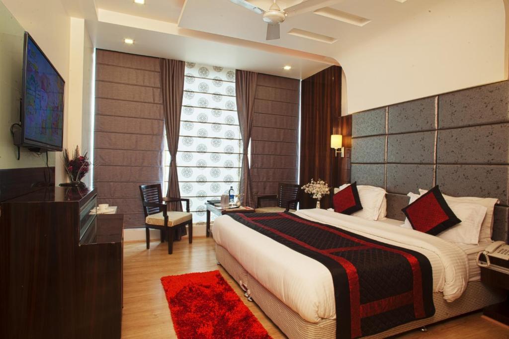 Hotel Delhi 55 -City Center Нью-Дели Номер фото